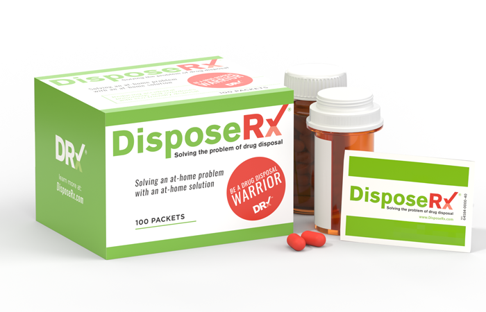 A background showing a selection of DisposeRx at-home medication disposal products