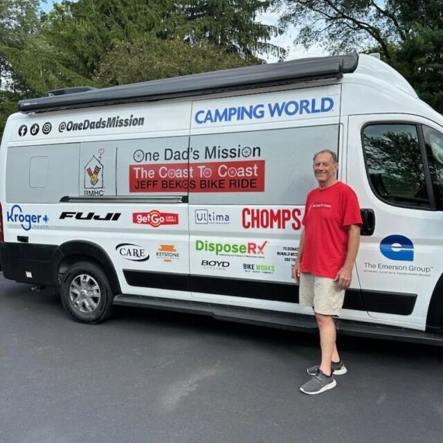 Jeff Bekos in front of his van.